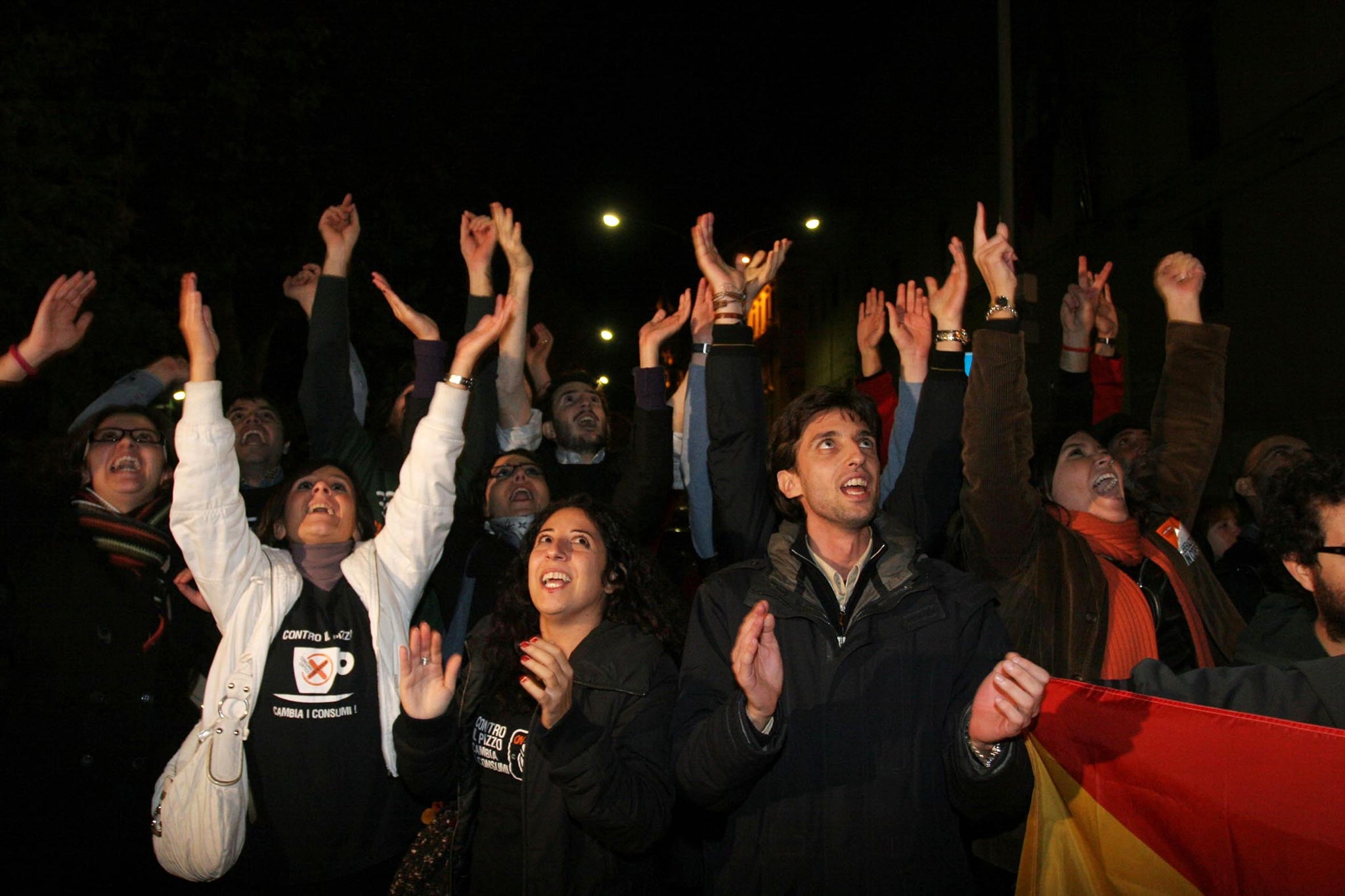 Sicilian locals celebrate after the arrest of mafia boss Domenico Raccuglia in 2009