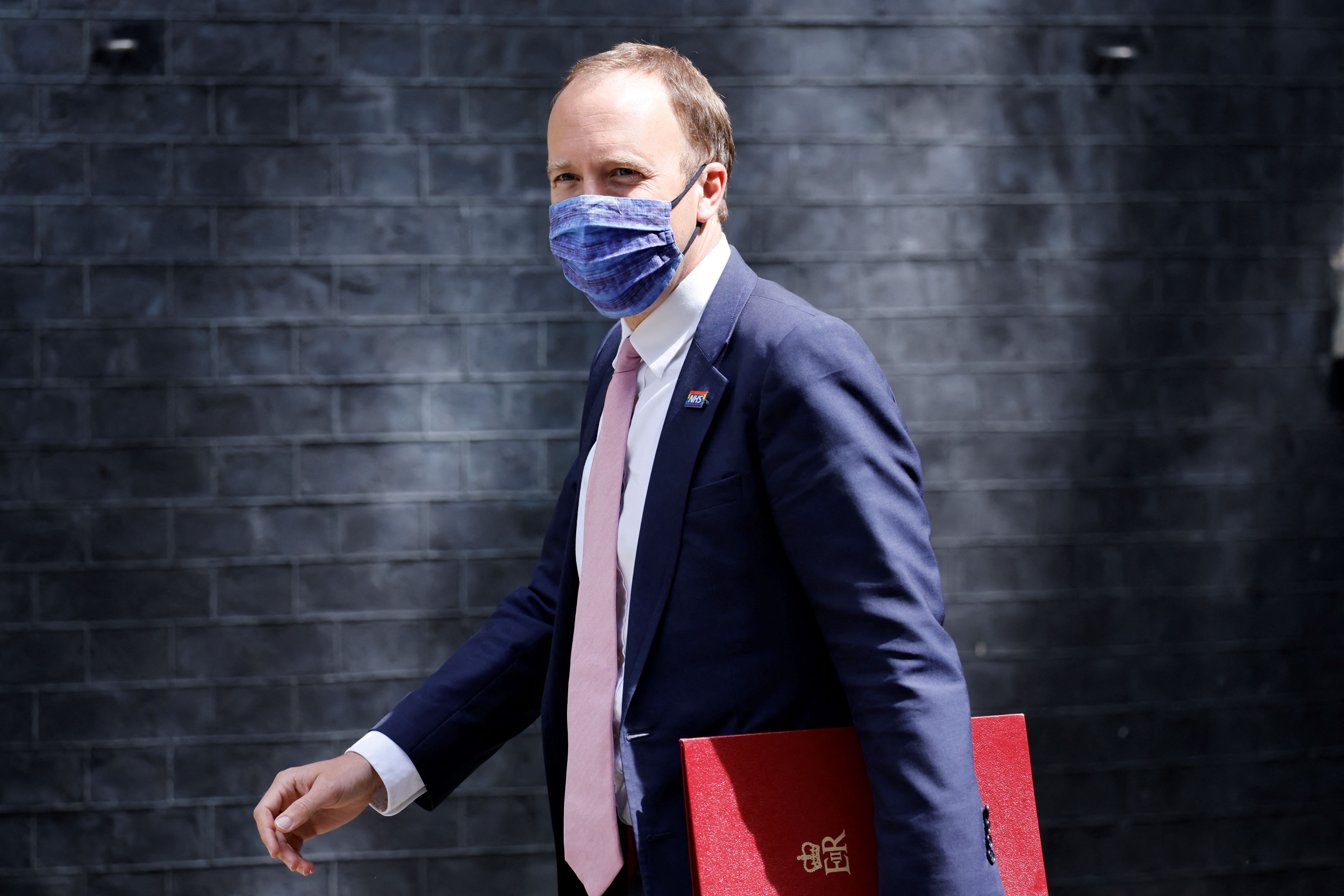 Then-Health Secretary Matt Hancock walks along Downing Street in central London on 15 June, 2021. Mr Hancock’s resignation dominated front pages on Sunday, 27 June, 2021.