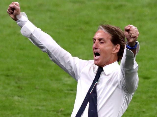 <p>Italy manager Roberto Mancini celebrates reaching the quarter-finals of Euro 2020</p>