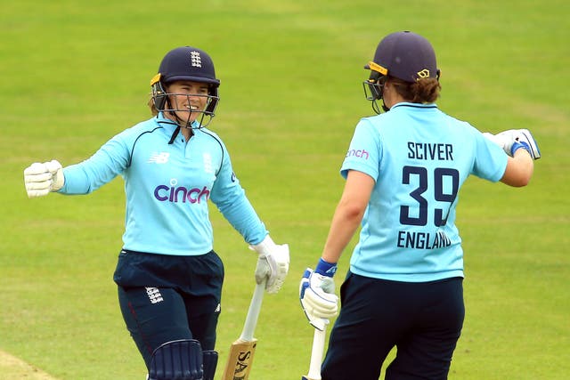 England’s Tammy Beaumont (left) and Nat Sciver celebrate victory