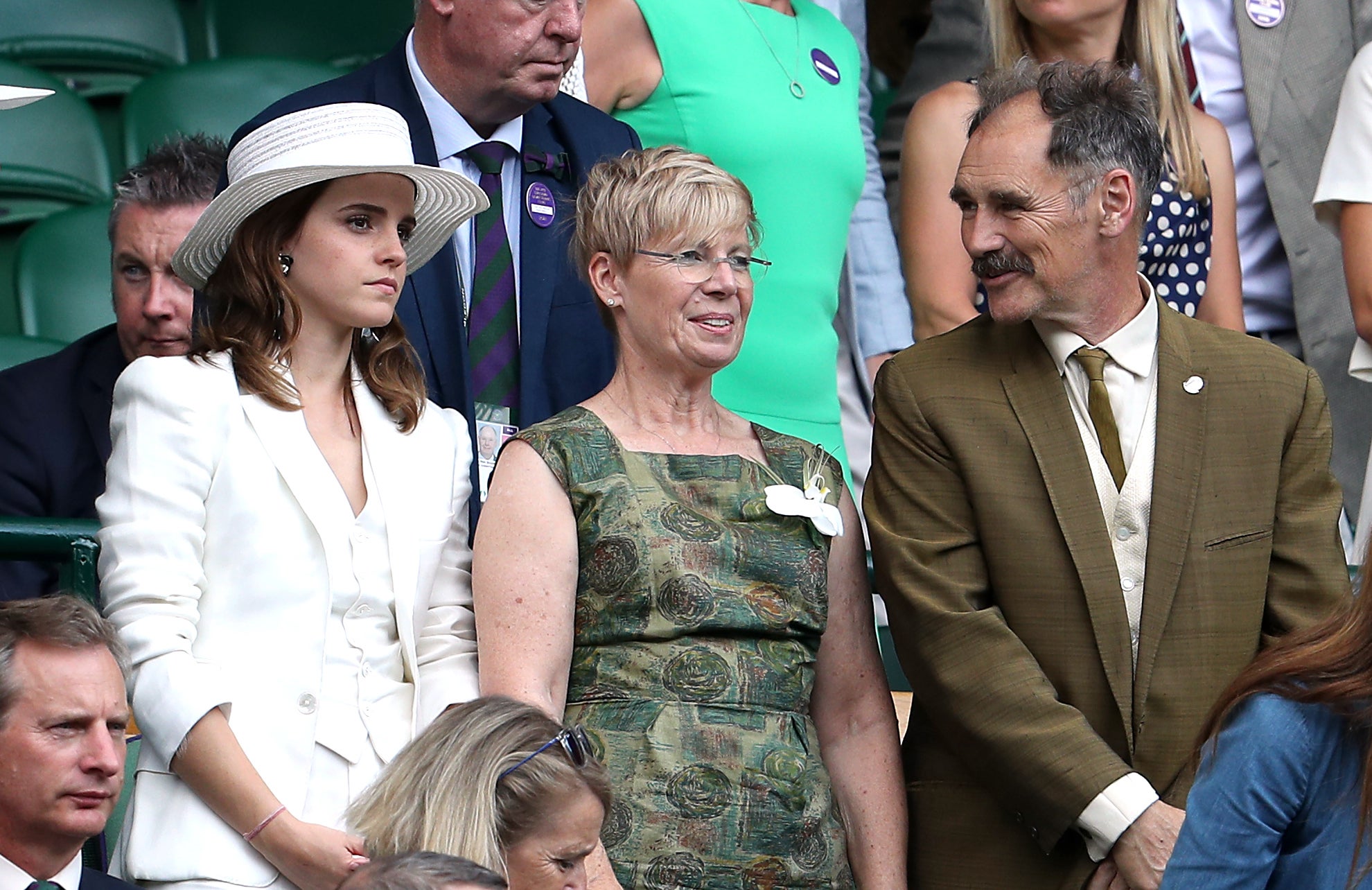 Emma Watson and Sir Mark and Lady Rylance in the royal box on centre court on day twelve of the Wimbledon Championships at the All England Lawn Tennis and Croquet Club, Wimbledon