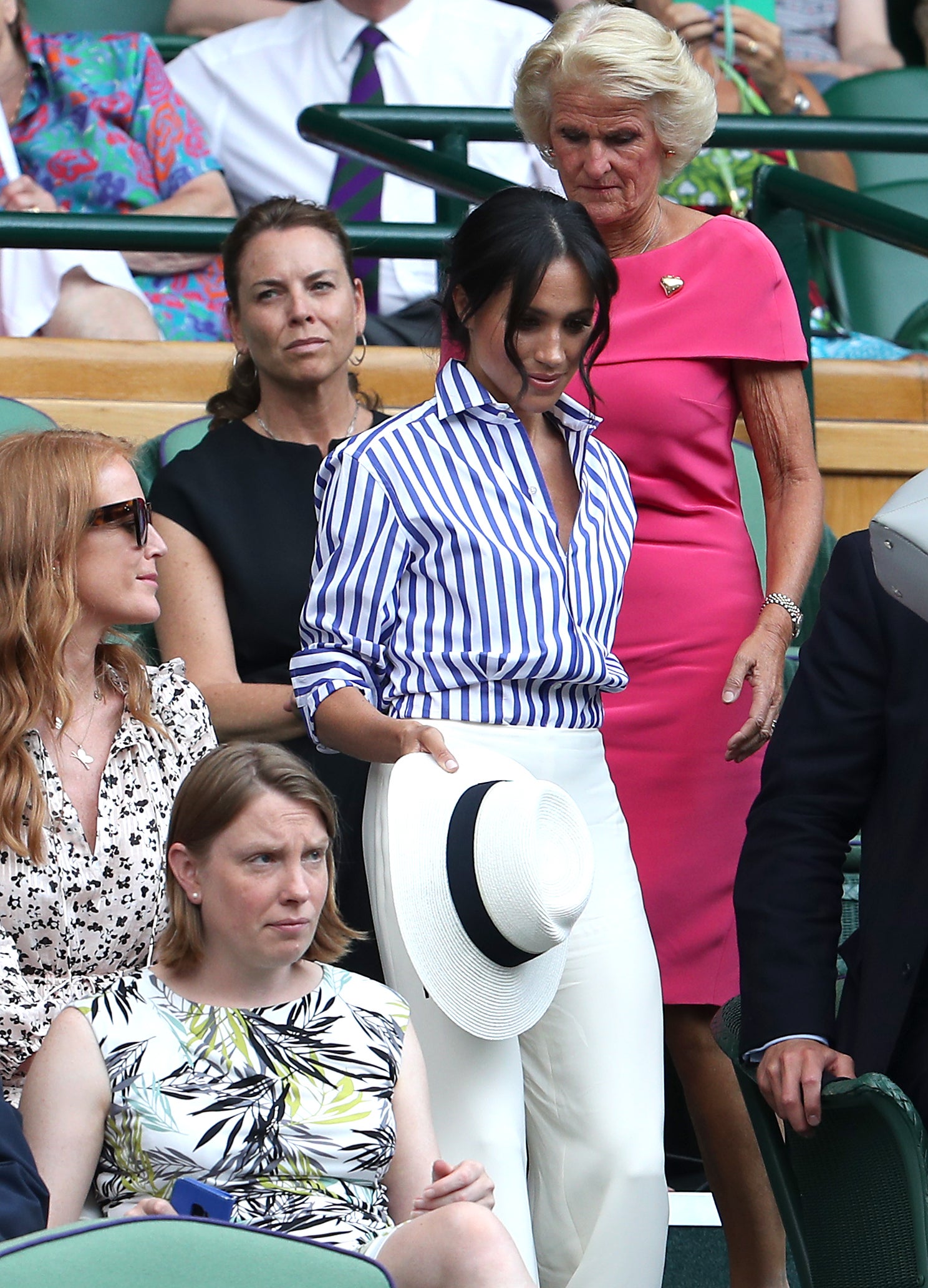 The Duchess of Sussex in the royal box on centre court on day twelve of the Wimbledon Championships at the All England Lawn Tennis and Croquet Club, Wimbledon
