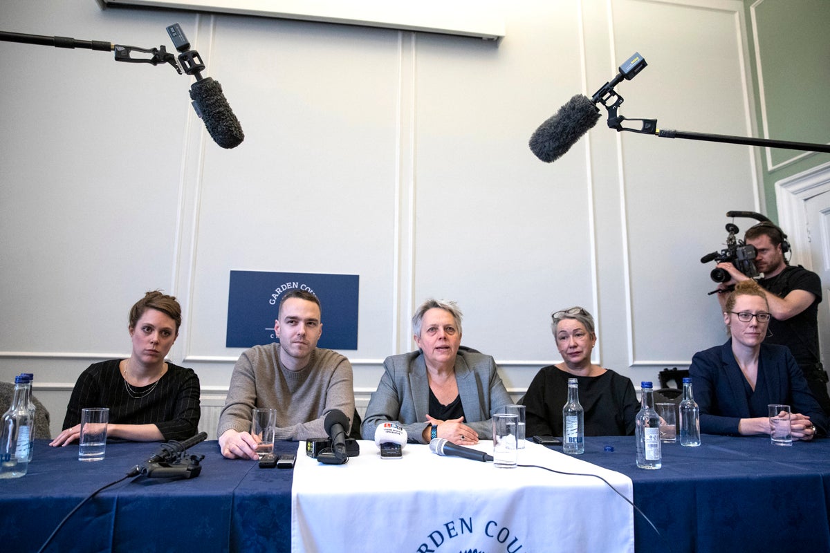 Wade (second from the right) and David Challen speaking at a press conference near the High Court on 28 February 2019