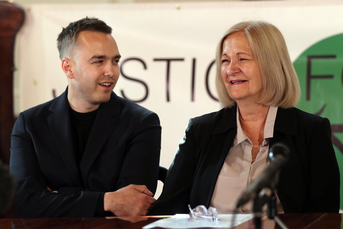 Sally Challen with her son David after she was told that she will not face a retrial over the death of her husband in 2010