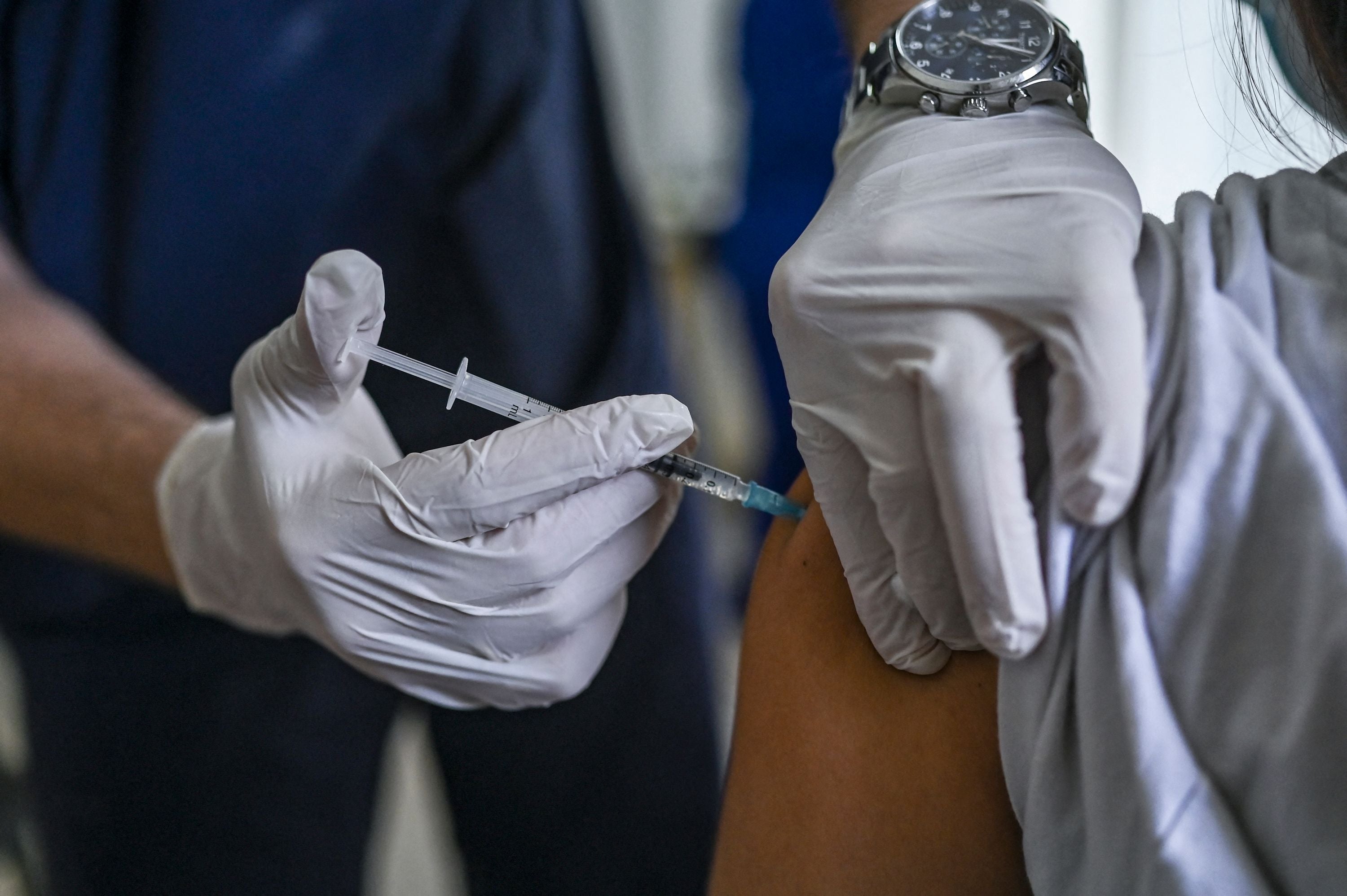A woman receives a Covid-19 vaccination on Elafonissos Island, Greece, on 23 April, 2021.