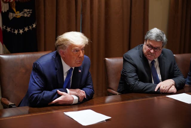 <p>Then-President Donald Trump, with then-Attorney General William Barr ,speaks during a discussion with state attorneys general on protection from social media abuses in the Cabinet Room of the White House in Washington, DC, on 23 September, 2020. Mr Trump has lashed out at Mr Barr after a report he called the ex-president’s claims of election fraud in the 2020 election ‘bulls***’.</p>