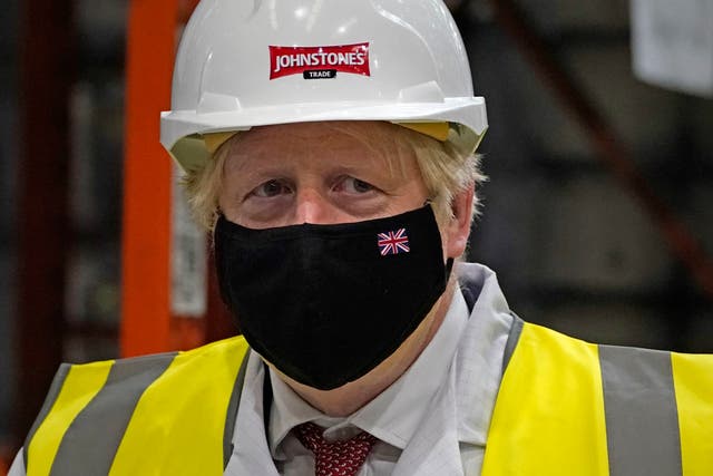 <p>Boris Johnson during a visit to Johnstone’s Paints Limited in Batley, West Yorkshire, ahead of the Batley and Spen by-election</p>