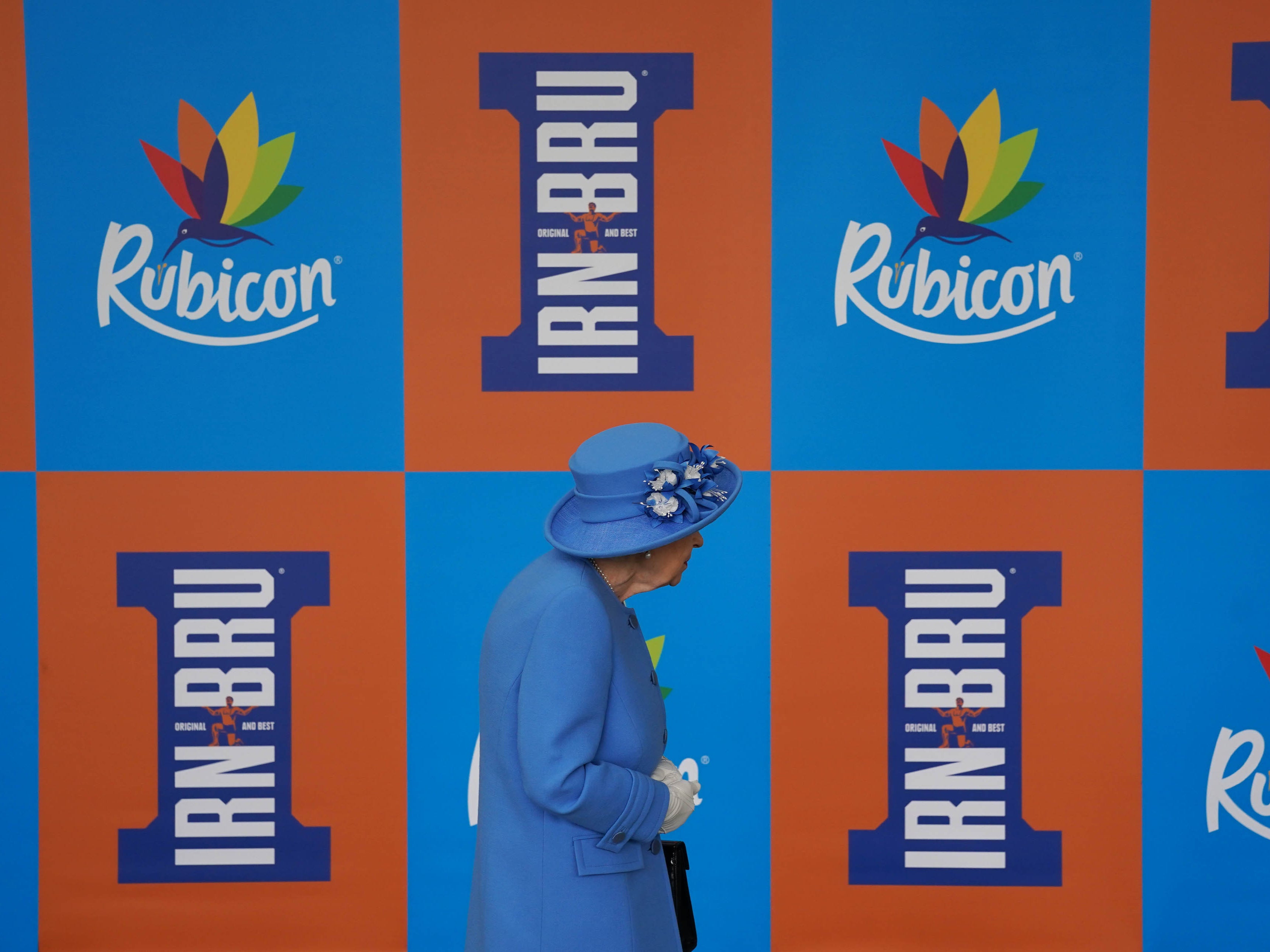 Queen Elizabeth II during a visit to AG Barr's factory in Cumbernauld, where the Irn-Bru drink is manufactured, as part of her traditional trip to Scotland for Holyrood Week