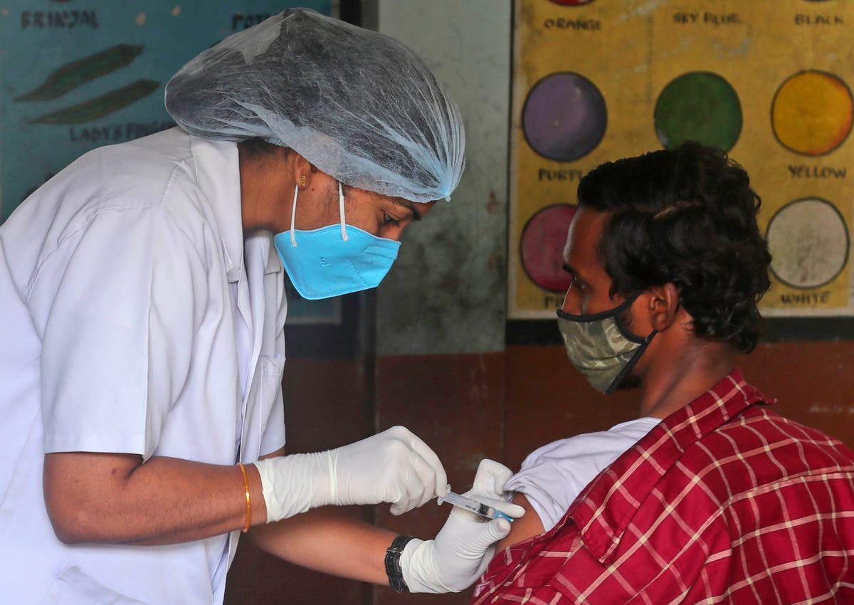 The Latest: Russia records highest daily virus death toll 