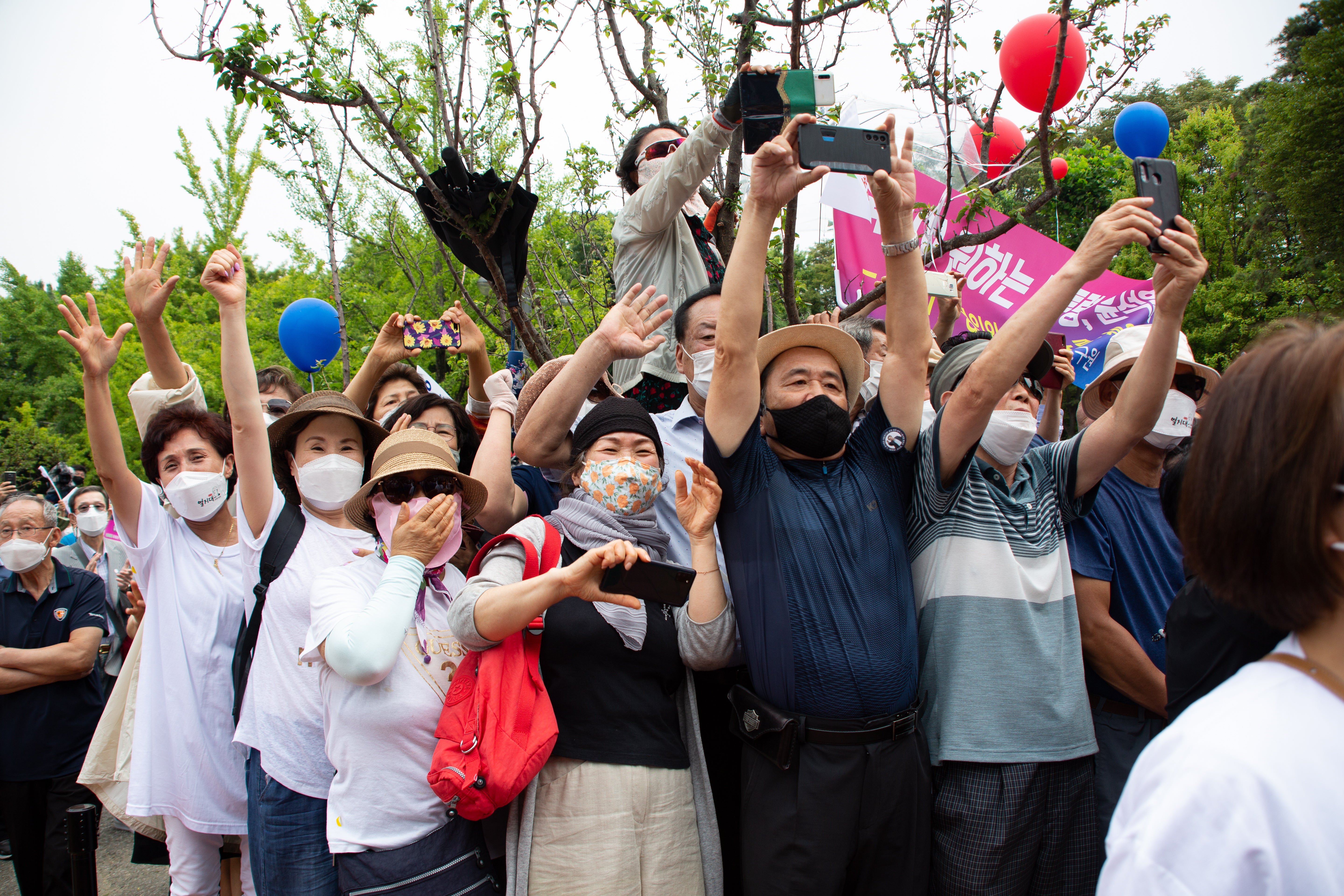 Supporters of the former South Korean Prosecutor General Yoon Suk-yeol, gather during the press conference