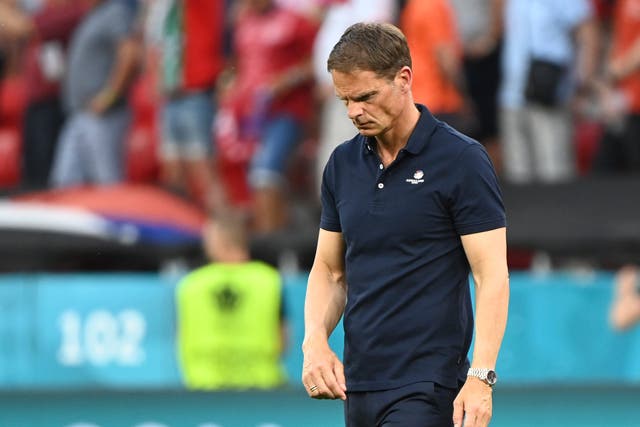 <p>Frank De Boer looks disappointed on the touchline</p>