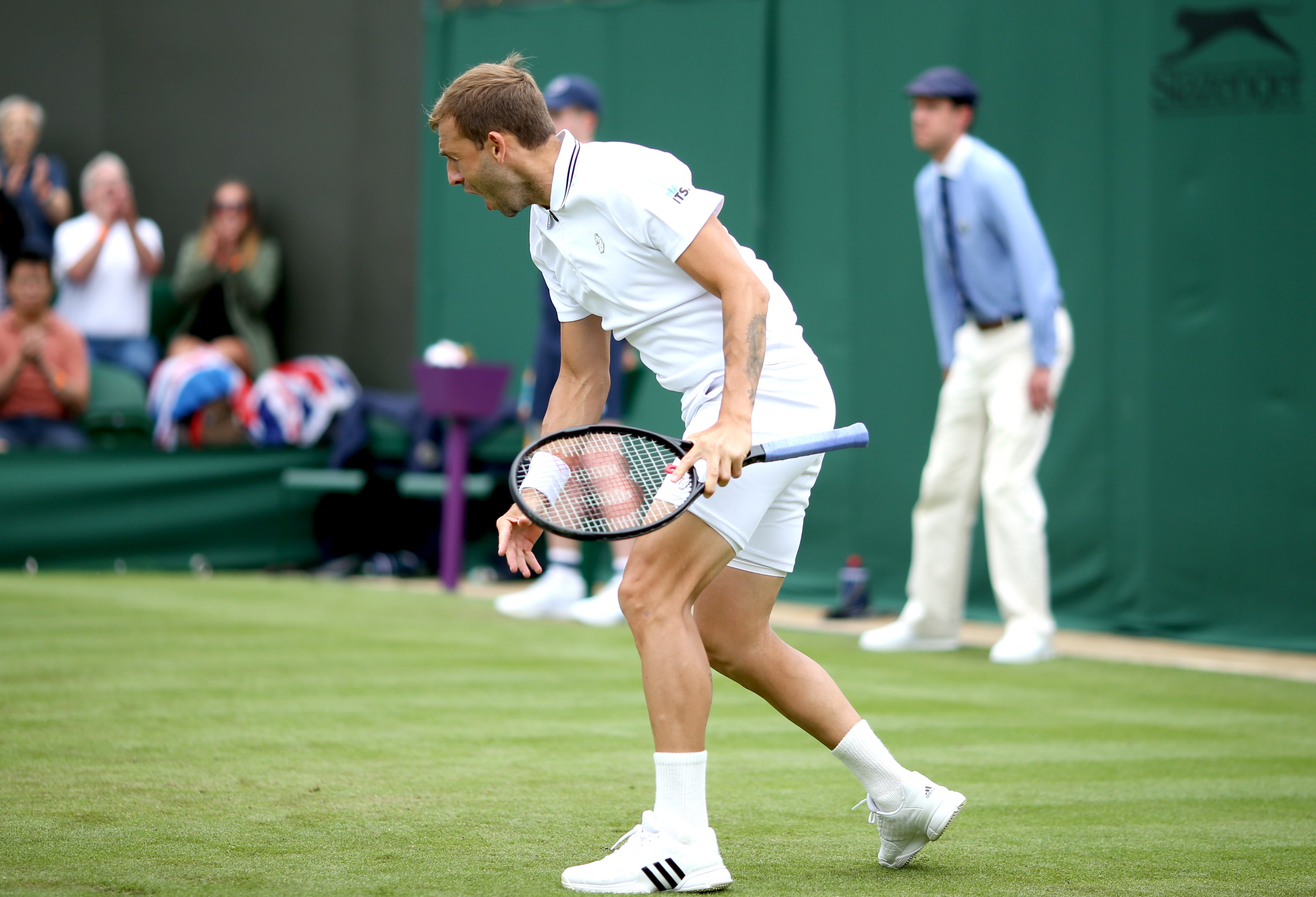<p>Dan Evans celebrates beating Feliciano Lopez</p>