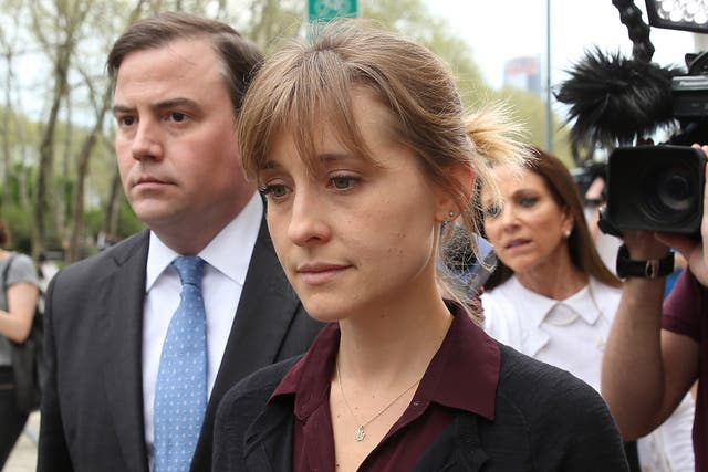 <p>Allison Mack leaves the US Eastern District Court after a bail hearing on 4 May 2018 in Brooklyn, New York City</p>