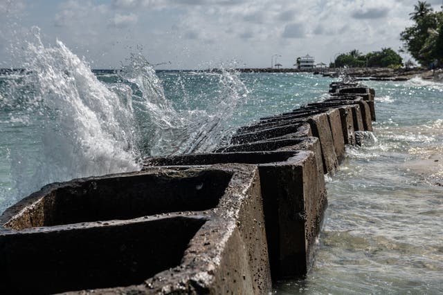 <p>Concrete blocks are placed along the shoreline to try and prevent further coastal erosion, on December 17, 2019 in Mahibadhoo, Maldives. </p>