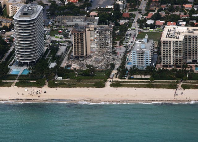 <p> Search and rescue personnel work after the partial collapse of the 12-story Champlain Towers South condo building on June 24, 2021 in Surfside, Florida</p>