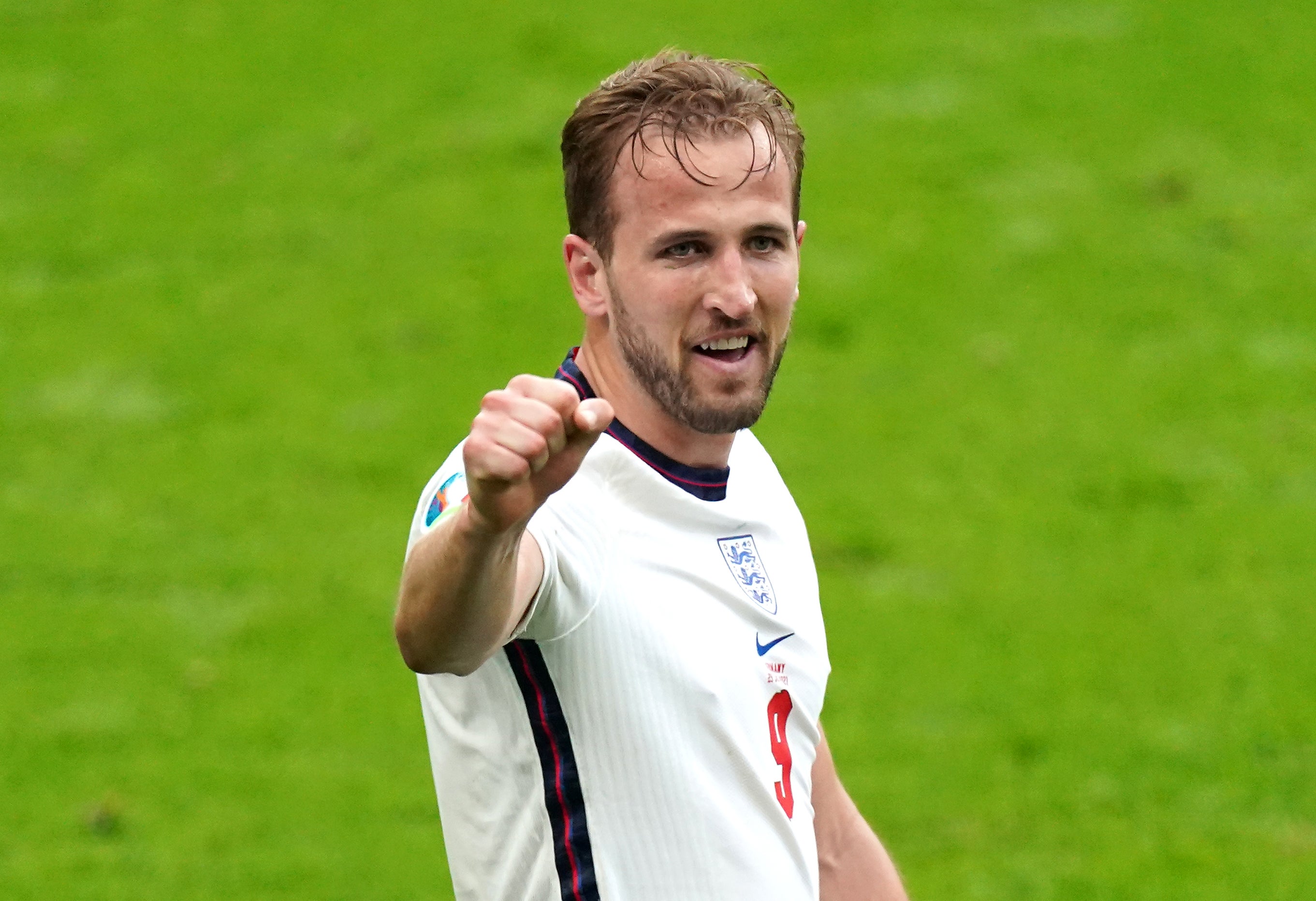 Harry Kane celebrates after heading home England's second goal against Germany