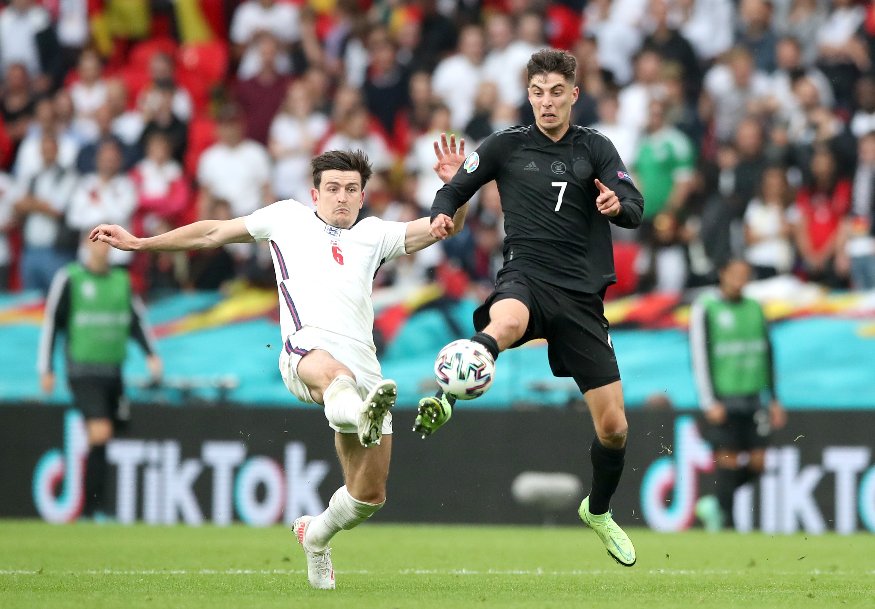 Harry Maguire (left) starred in England's win