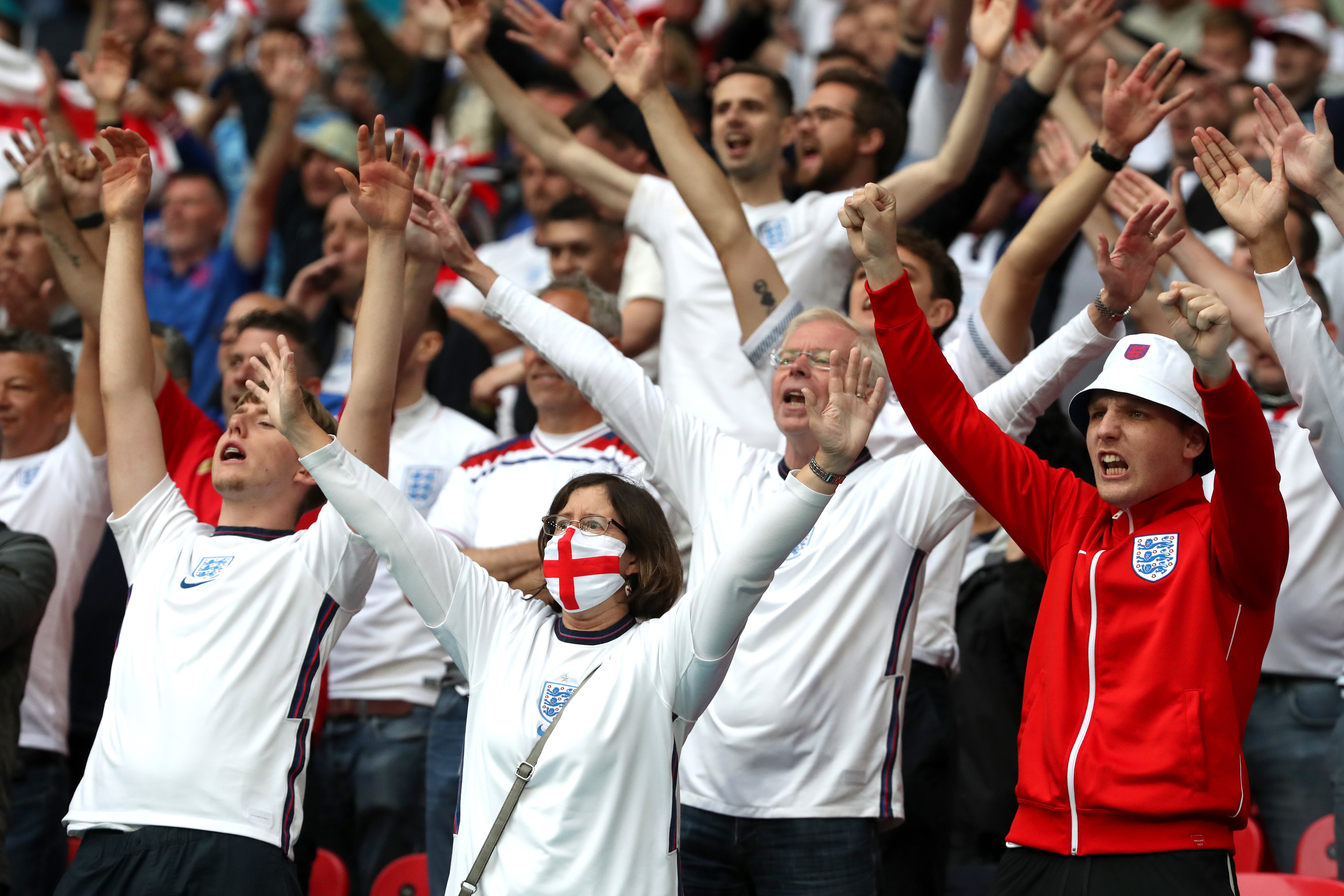 England fans celebrate the Three Lions' victory at Wembley against old foe Germany