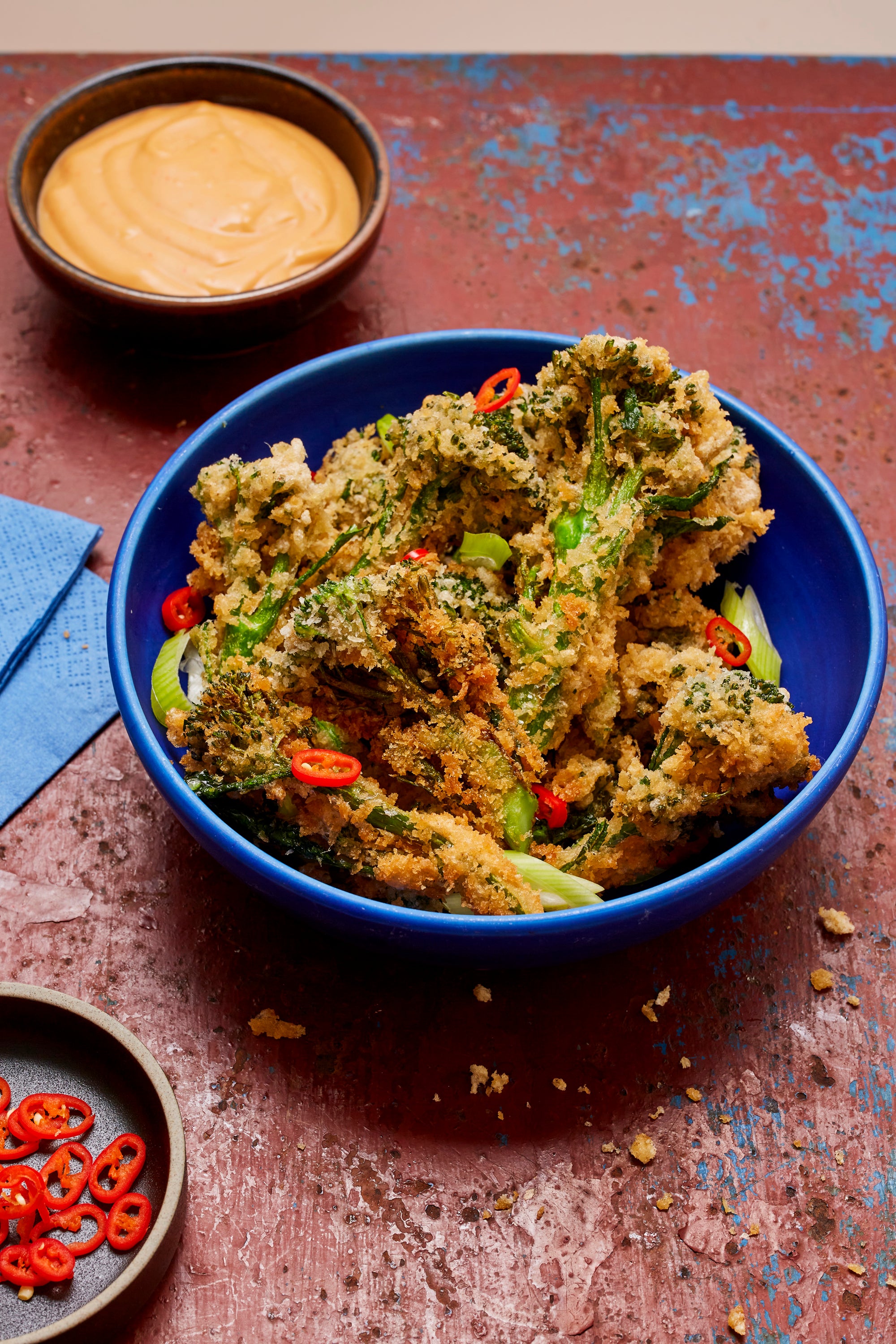 Crispy, deep-fried broccoli with chilli oil