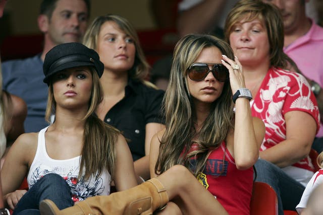 <p>Cheryl Tweedy and Victoria Beckham at the 2006 World Cup</p>