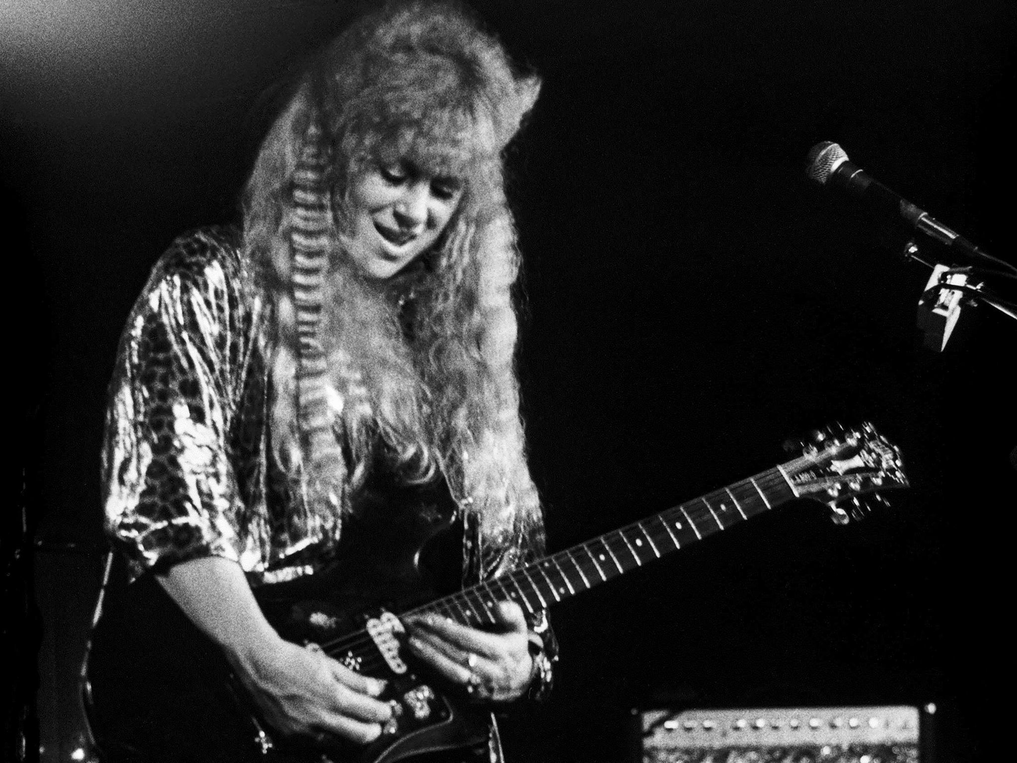 McIlwaine performing at a 1987 album release party in Toronto