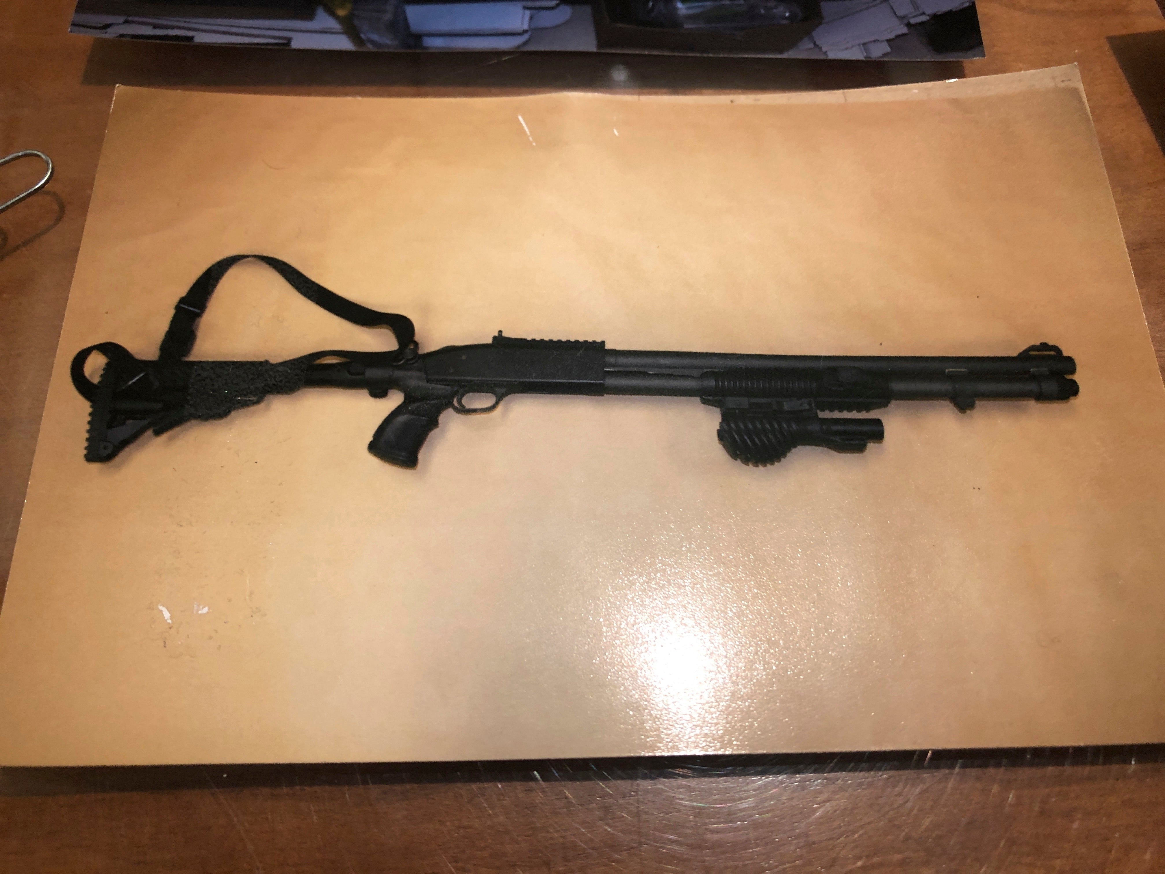 A photograph of the 12-gauge Mossberg shotgun authorities say was used by Jarrod Ramos in the mass shooting at the Capital Gazette newspaper three years ago is shown in evidence after court on Tuesday, June 29, 2021 in Annapolis, Md.