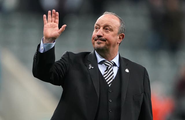 Rafael Benitez waves to the stands