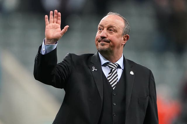 Rafael Benitez waves to the stands