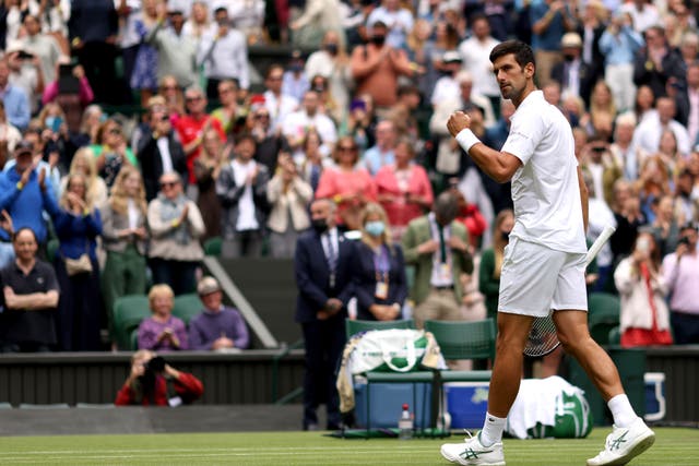 <p>Novak Djokovic made it through to round three with a straight-sets win against Kevin Anderson at Wimbledon</p>