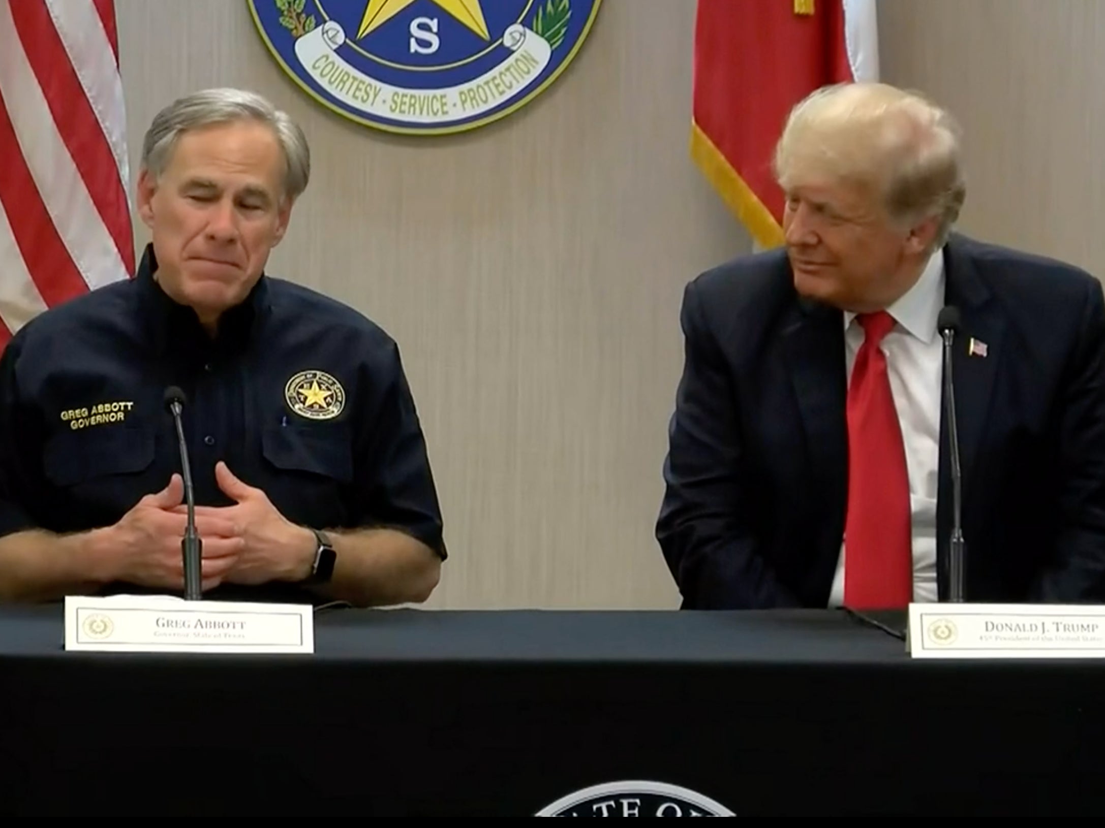 Texas governor Greg Abbott introduces former president Donald Trump at a meeting about the border