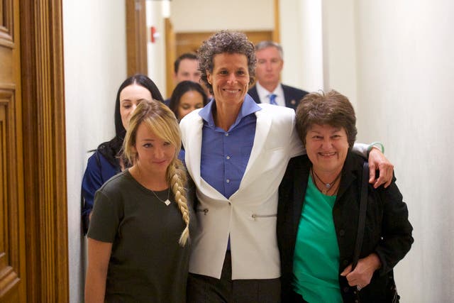 <p>Bill Cosby accuser Andrea Constand (C) reacts with lawyer Dolores Troiani (R) and Delaney Henderson (L) after the guilty on all counts verdict was delivered in the sexual assault retrial at the Montgomery County Courthouse on April 26, 2018 in Norristown, Pennsylvania</p>