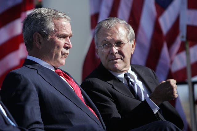 <p>Donald Rumsfeld with President George W Bush in 2006</p>