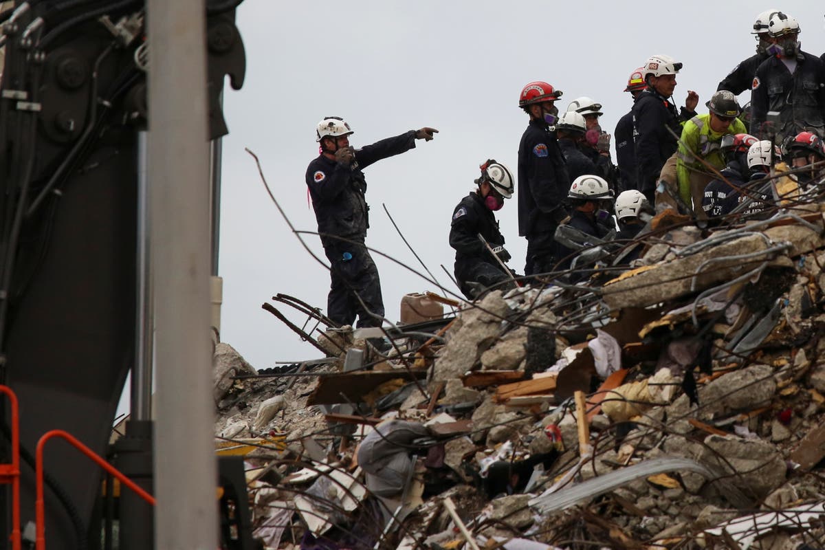 Rescue effort suspended at Surfside as building shifts hours before Biden arrival