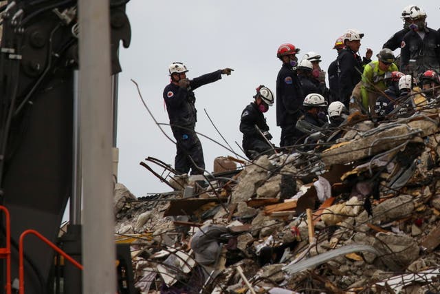 <p>Rescue personnel continue the search and rescue operation at the site of the partially collapsed building in Surfside on 30 June, 2021 </p>