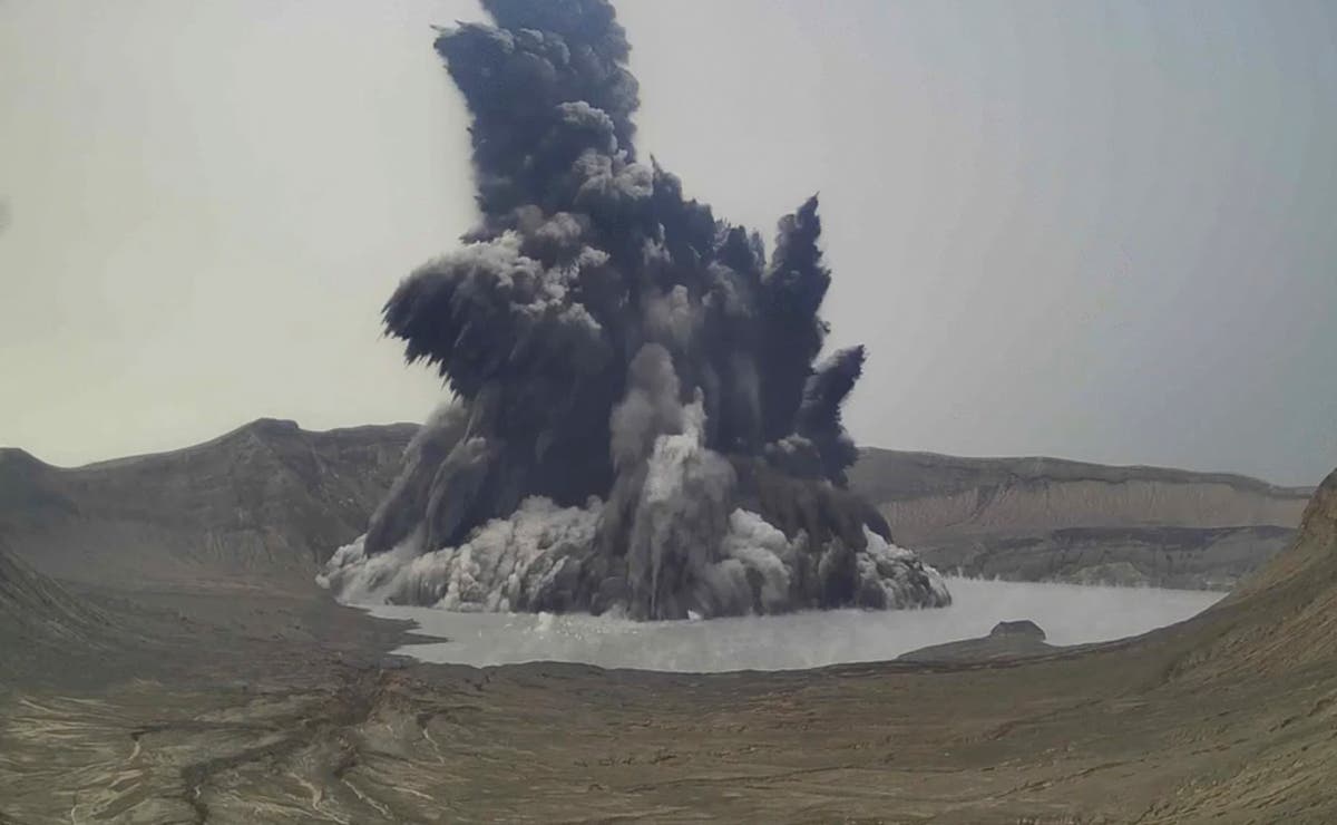 Philippine volcano belches dark plume, villagers evacuated 