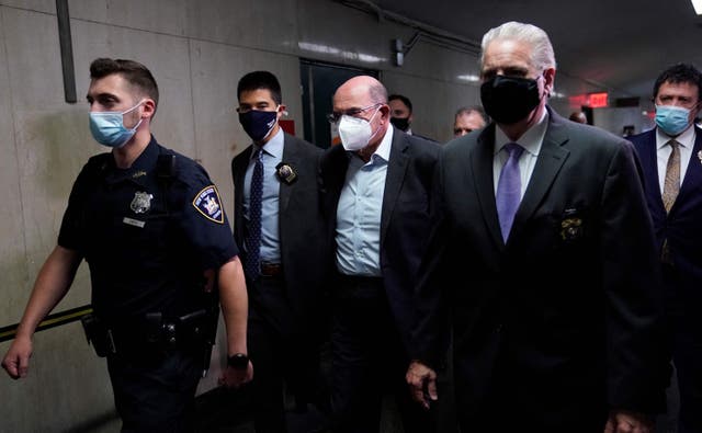 <p>Allen Weisselberg (C) former US President Donald Trumps company chief financial officer arrives to attend the hearing </p>