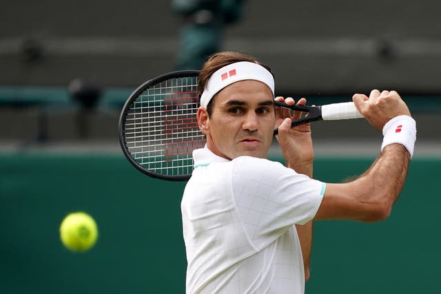 Roger Federer plays a shot