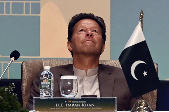 <p>File photo: Pakistan’s Prime Minister Imran Khan looks on during a Trade and Investments conference in Colombo on 24 February 2021</p>