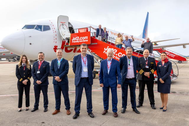 <p>Jet2’s chief executive, Steve Heapy, pictured with his team at Bristol airport</p>