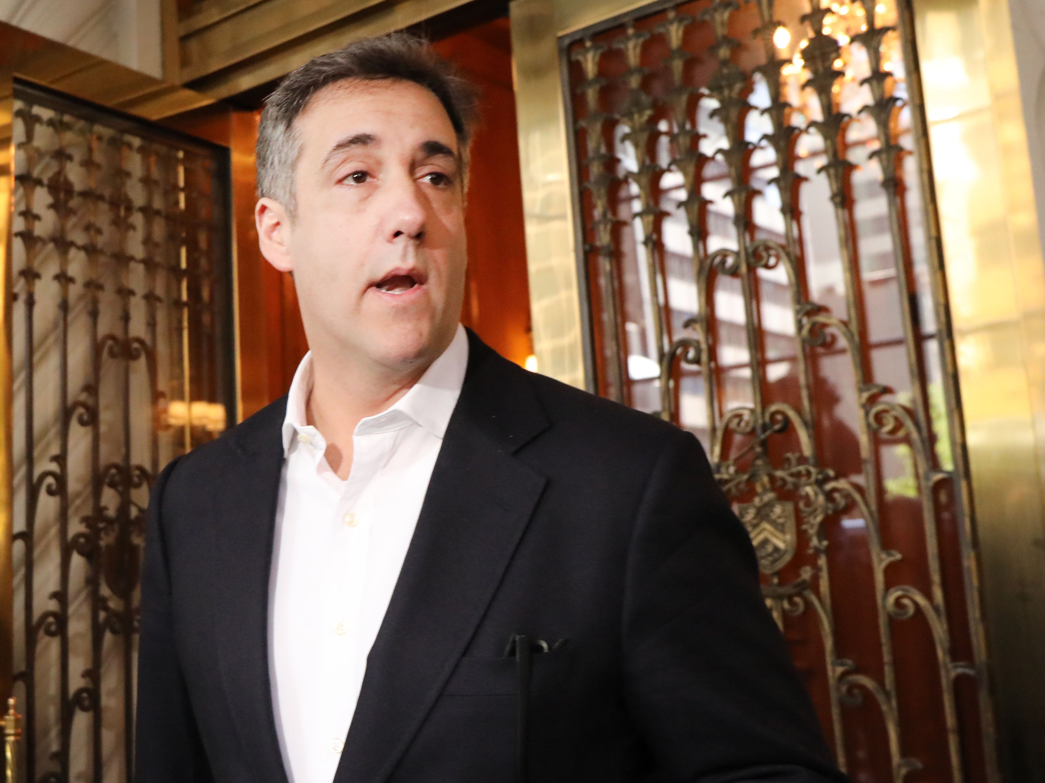Michael Cohen, the former personal attorney to President Donald Trump, prepares to speak to the media before departing his Manhattan apartment for prison on 6 May, 2019 in New York City. Cohen has said the charges against the Trump Organization and its CFO are just the ‘tip of the iceberg’.