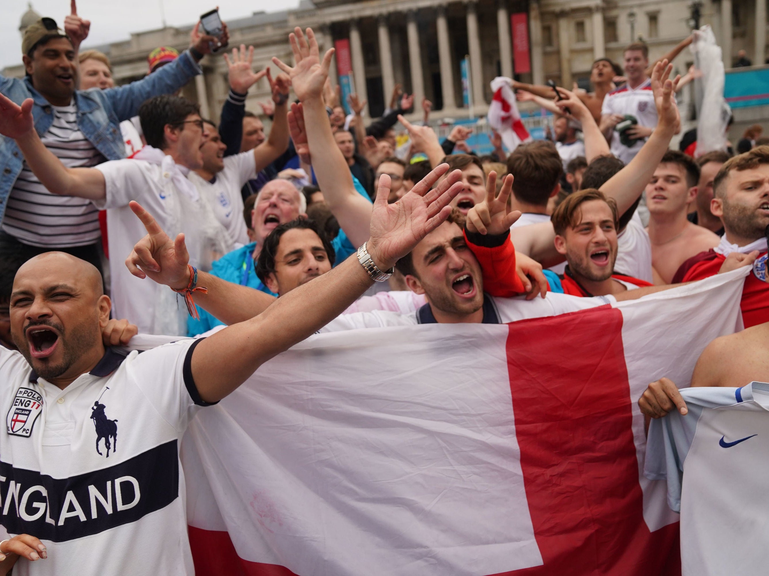 England fans celebrate in Trafalgar Square after England beat Germany 2-0 on Tuesday