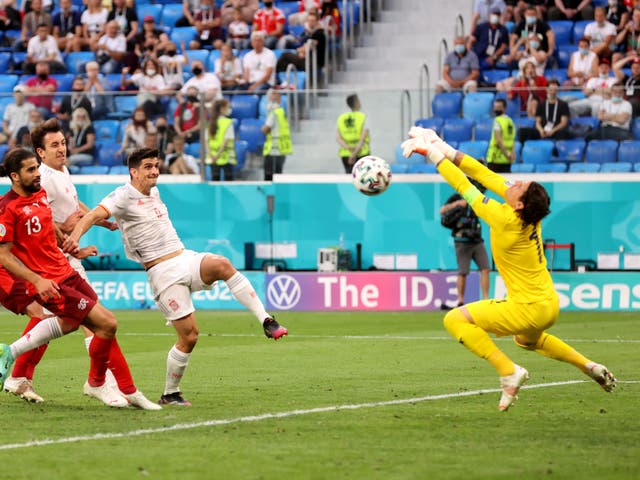 <p>Yann Sommer makes one of many saves to deny Spain</p>
