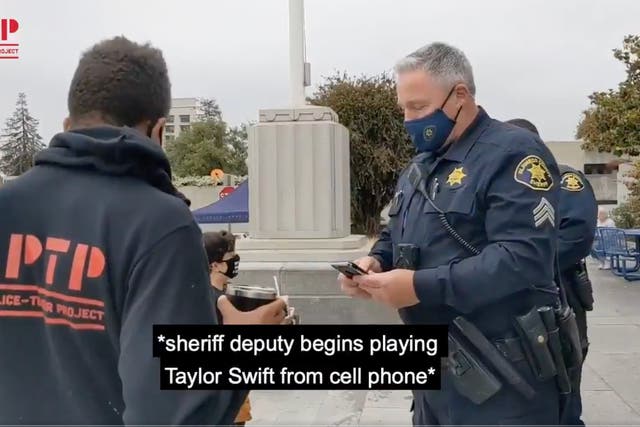 <p>Police officer plays Taylor Swift video to prevent protest video going on YouTube</p>