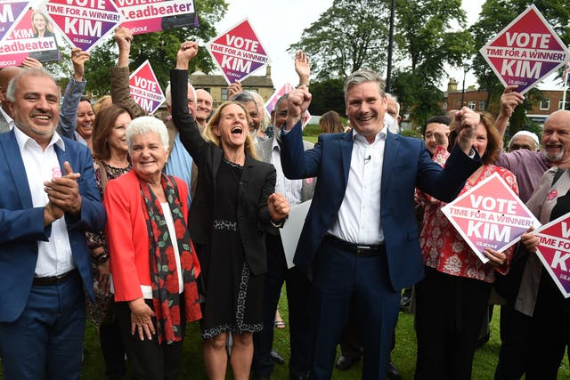 <p>Keir Starmer and Labour candidate Kim Leadbeater celebrate with supporters in Cleckheaton Memorial Park during a visit following Labour's victory in the Batley and Spen by-election, in Cleckheaton, West Yorkshire on July 2</p>