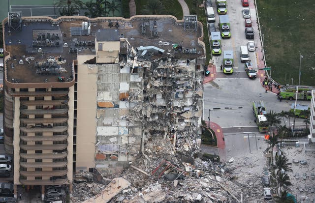 <p>Search and Rescue personnel work after the partial collapse of the 12-story Champlain Towers South condo building on June 24, 2021 in Surfside, Florida.</p>