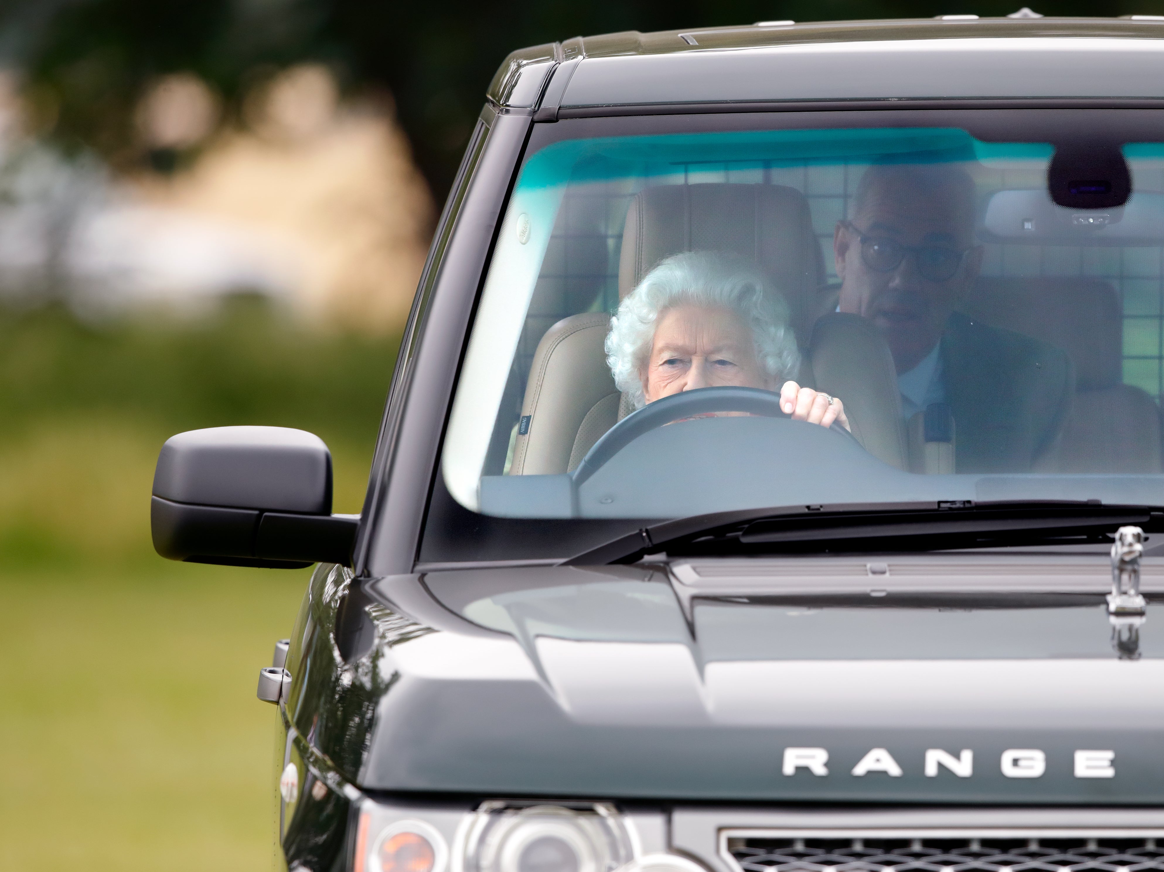 Queen Elizabeth II seen driving her Range Rover car as she attends day 2 of the Royal Windsor Horse Show in Home Park, Windsor Castle
