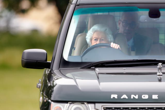 <p>Queen Elizabeth II seen driving her Range Rover car as she attends day 2 of the Royal Windsor Horse Show in Home Park, Windsor Castle</p>