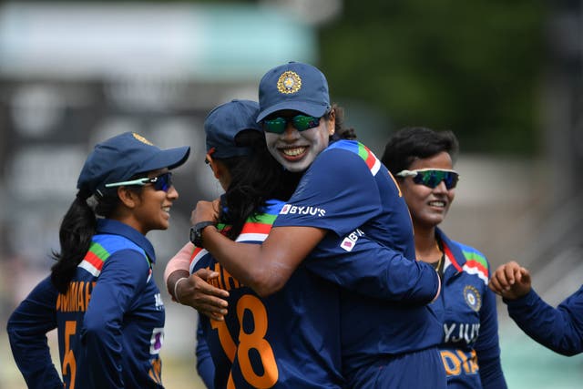 <p>India’s Deepti Sharma, centre, celebrates against England</p>