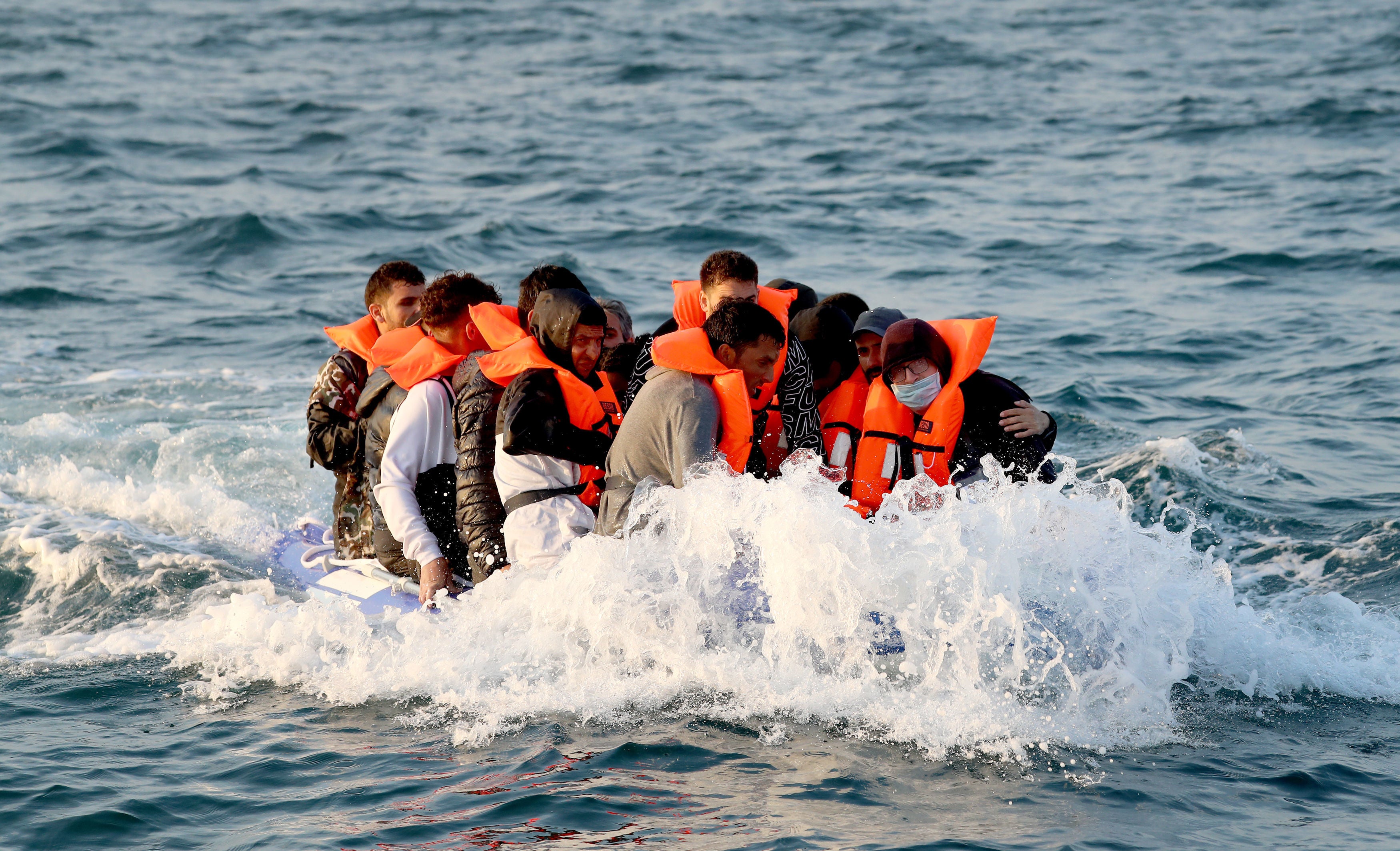 Migrants crossing the Channel in a small boat headed in the direction of Dover last year