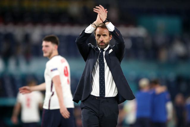 <p>Gareth Southgate salutes the England supporters</p>